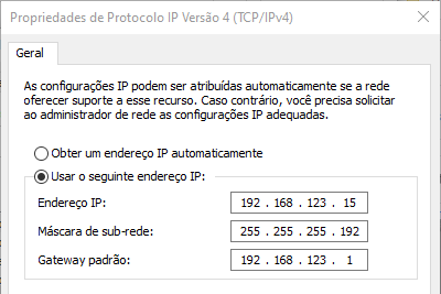 A imagem mostra um recorte da captura de tela de propriedade de Protocolo IP Versão 4( TCP/IPva4), na guia Geral, há um texto explicativo e em seguida há duas opções: Obter um endereço IP automaticamente e Usar o seguinte endereço IP. A útlima opção está marcada e dentro dela há os itens:  Endereço IP: 192.168.123.15. Máscara de sub-rede: 255.255.255.192. Gateway padrão: 192.168.123.1.